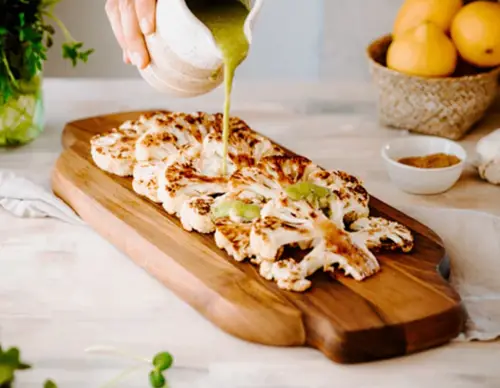 Roasted Cauliflower Steaks with Green Tahini Sauce